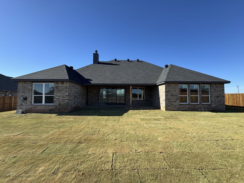 Front exterior of a new home in Coyote Crossing, Godley, TX, highlighting curb appeal (Image 22). Front exterior of a new home in Coyote Crossing, Godley, TX, highlighting curb appeal (Image 22).