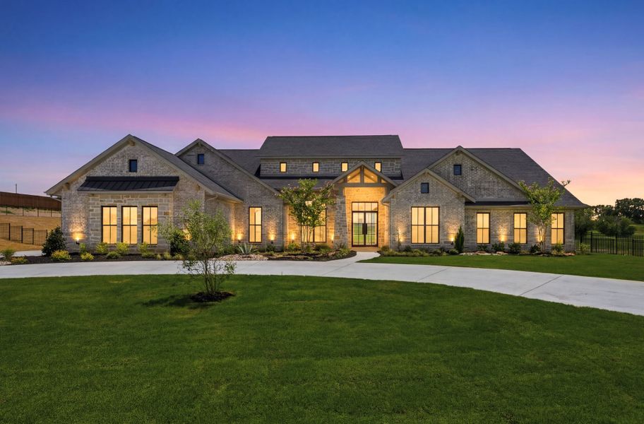 Front exterior of a new home in Fleming Pointe, Fort Worth, TX, highlighting curb appeal (Image 1). Front exterior of a new home in Fleming Pointe, Fort Worth, TX, highlighting curb appeal (Image 1).