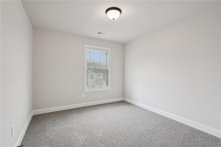 Spacious, unfurnished interior of a new home in Hemingway - Reserve Series, Cumming (Image 20).