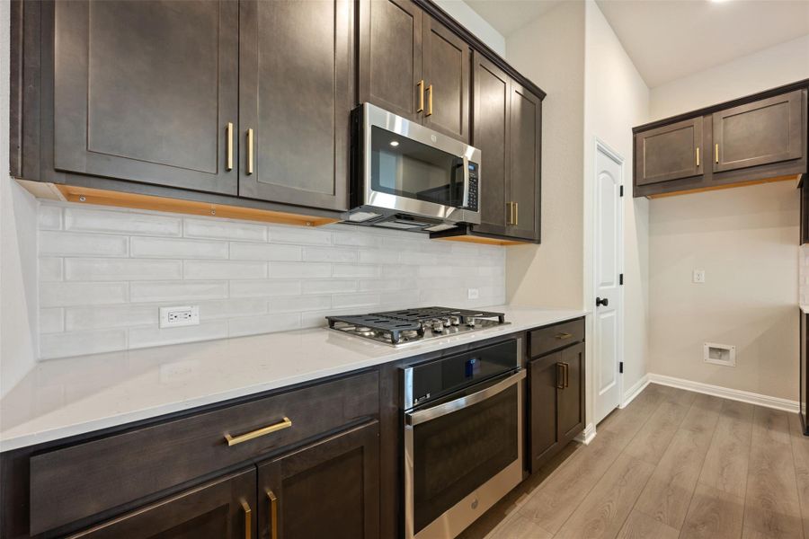 Furnished interior view inside a new home in Berry Creek Highlands, Georgetown (Image 4).