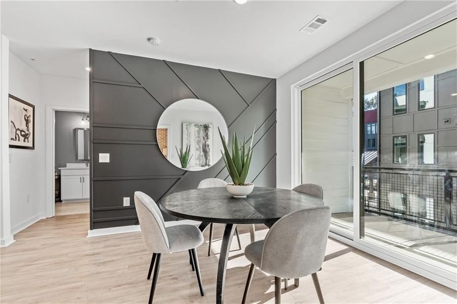 The dining area opens to the balcony.  *Images from the model home. Not subject unit*Perfect for your morning coffee or tea.