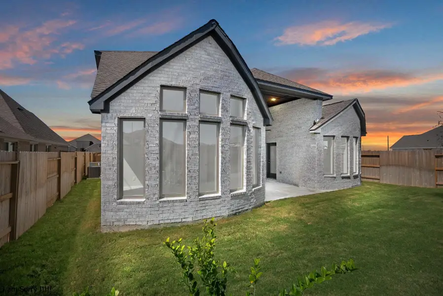 Exterior details and patio area of a home in Valencia, Manvel (Image 3). Exterior details and patio area of a home in Valencia, Manvel (Image 3).