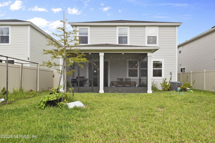 Front exterior of a new home in , St. Johns, FL, highlighting curb appeal (Image 2).