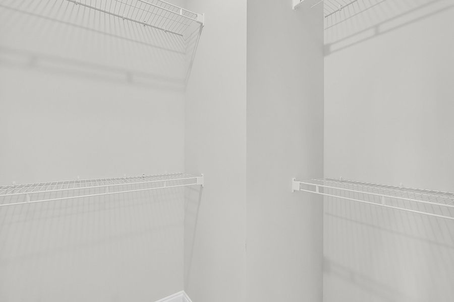 Spacious, unfurnished interior of a new home in Tidewater at Lakes of Cane Bay, Summerville (Image 48).