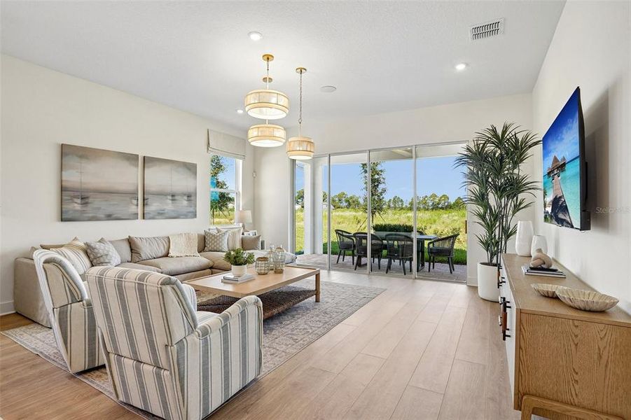 Furnished interior view inside a new home in Northlake at Ovation, Winter Garden (Image 12).