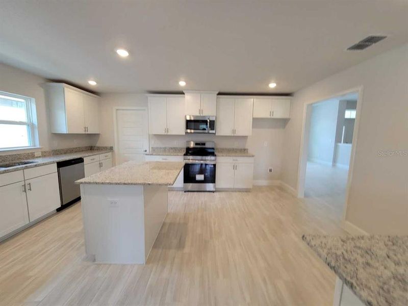 Furnished interior view inside a new home in , Ocala (Image 10).