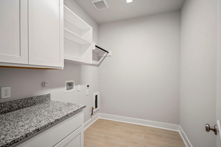 Furnished interior view inside a new home in ARTAVIA 55' Lots, Conroe (Image 19).