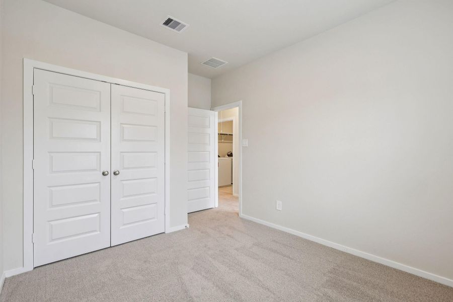 Spacious, unfurnished interior of a new home in Pinewood Trails - City Series, Atascocita (Image 19).