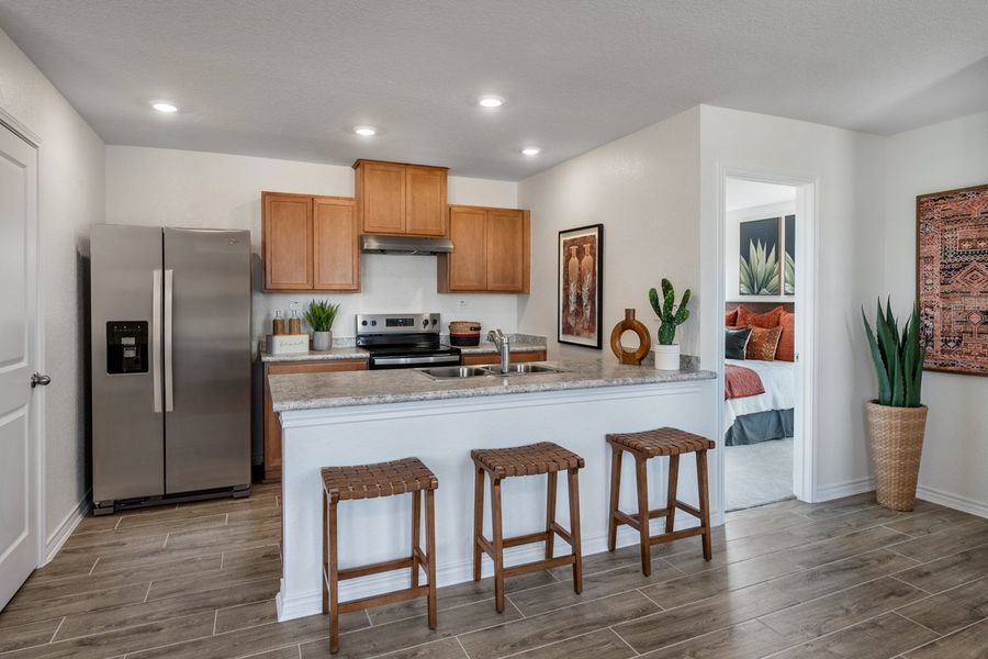 Representative furnished interior of a home built from the Plan 1417 Modeled by KB Home in Woodside Farms, Seguin (Image 5). Representative furnished interior of a home built from the Plan 1417 Modeled by KB Home in Woodside Farms, Seguin (Image 5).