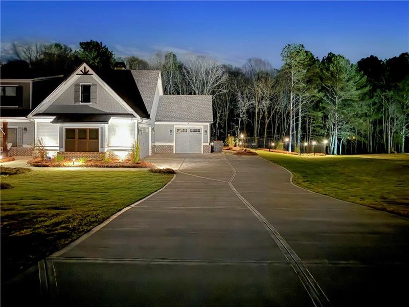 Front exterior of a new home in , Monroe, GA, highlighting curb appeal (Image 23).