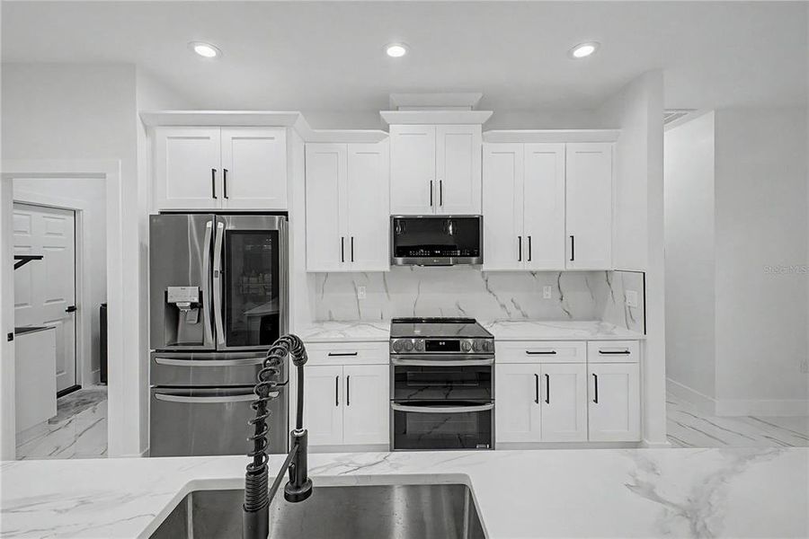 Furnished interior view inside a new home in , Weeki Wachee (Image 41).