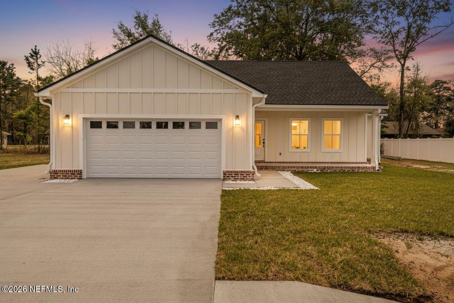 Front exterior of a new home in , Macclenny, FL, highlighting curb appeal (Image 28).