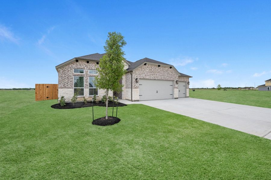 Front exterior of a new home in Beacon Hill, Waller, TX, highlighting curb appeal (Image 19).