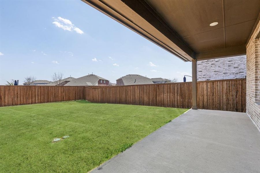 Exterior details and patio area of a home in AnaCapri, Anna (Image 3). Exterior details and patio area of a home in AnaCapri, Anna (Image 3).