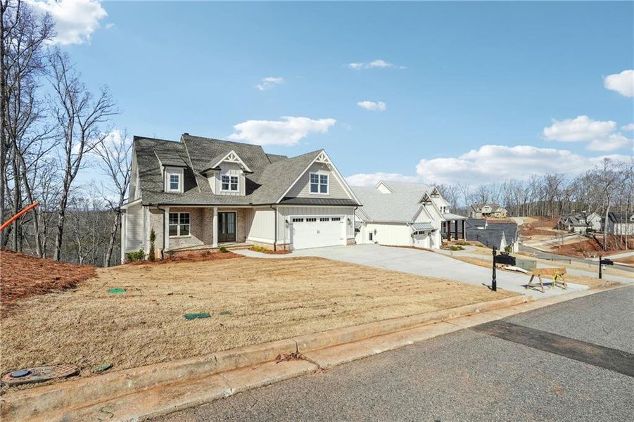 Front exterior of a new home in , Dawsonville, GA, highlighting curb appeal (Image 23).