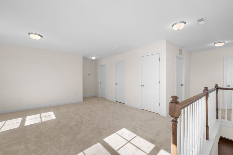 Spacious, unfurnished interior of a new home in Miller's Reserve, Winston-Salem (Image 53).
