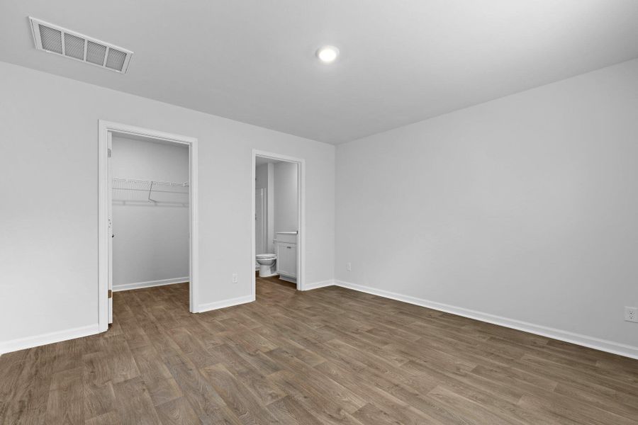 Spacious, unfurnished interior of a new home in Pine Hills at Cane Bay, Summerville (Image 18). Spacious, unfurnished interior of a new home in Pine Hills at Cane Bay, Summerville (Image 18).