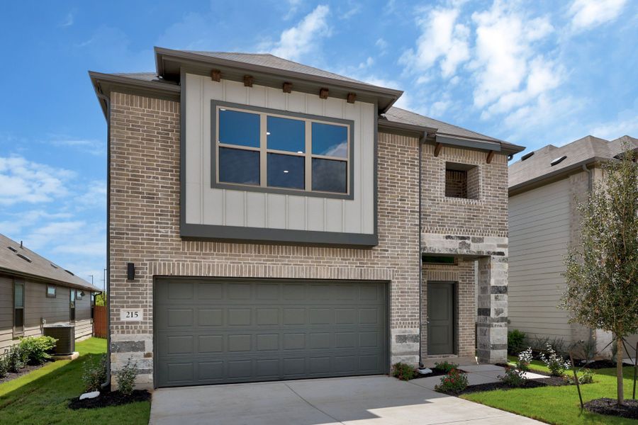 Front exterior of a new home in Trinity Ranch, Elgin, TX, highlighting curb appeal (Image 22).