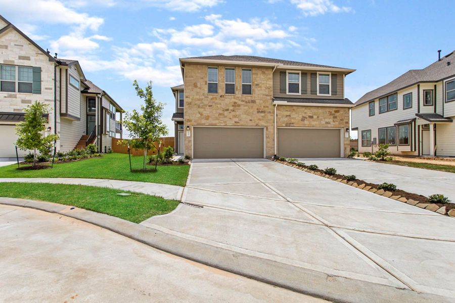 Front exterior of a new home in Woodforest, Montgomery, TX, highlighting curb appeal (Image 22).