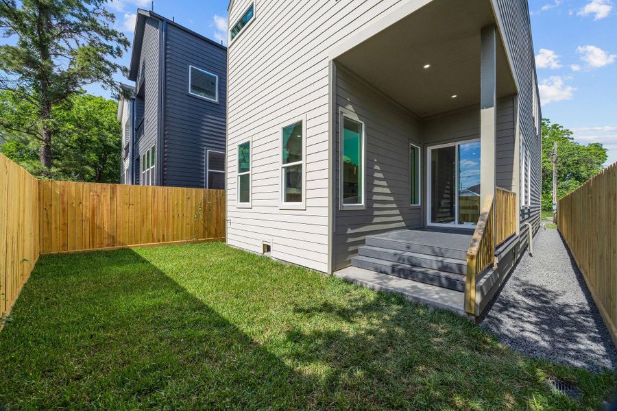 Exterior details and patio area of a home in , Houston (Image 3).