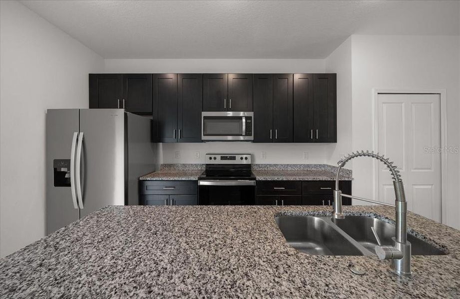 Furnished interior view inside a new home in , Ocala (Image 26).