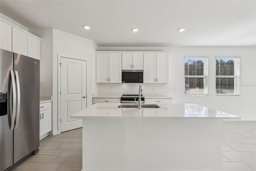 Furnished interior view inside a new home in Colbert Landings, Palm Coast (Image 3).