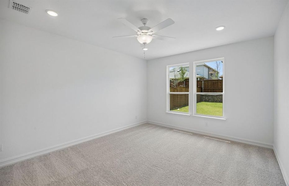 Spacious owners suite with large windows