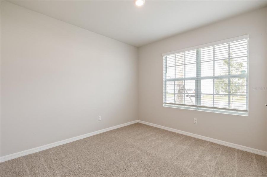 Spacious, unfurnished interior of a new home in Seagrass, Punta Gorda (Image 8).