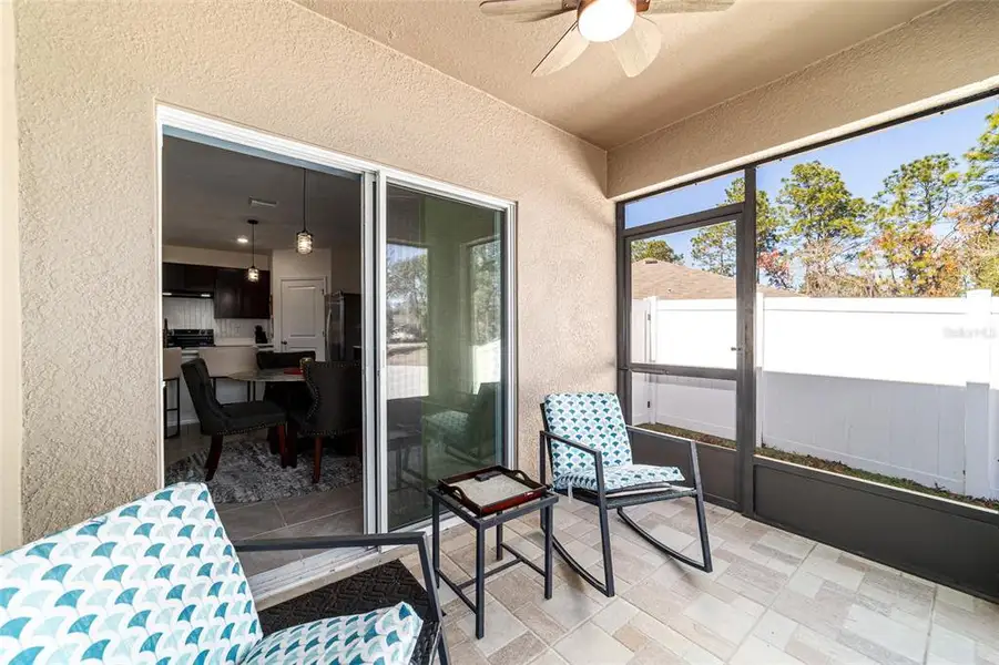 Exterior details and patio area of a home in Lake Diamond, Ocala (Image 4).