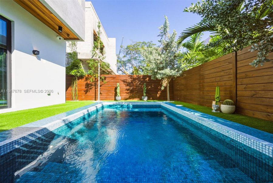 Exterior details and patio area of a home in , Miami (Image 53).