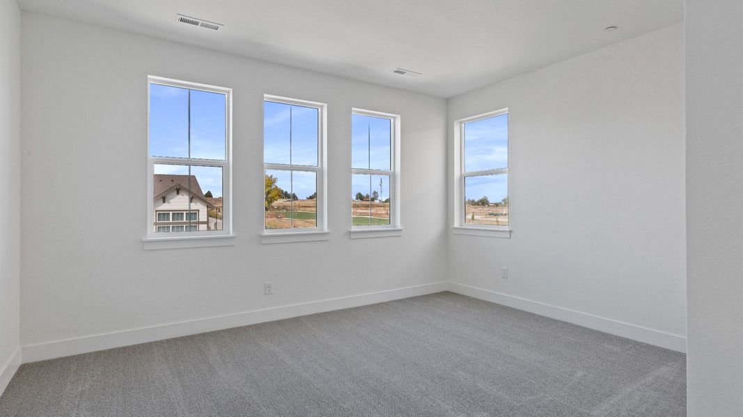 Furnished interior view inside a new home in Dillon Pointe - Journey, Broomfield (Image 31).