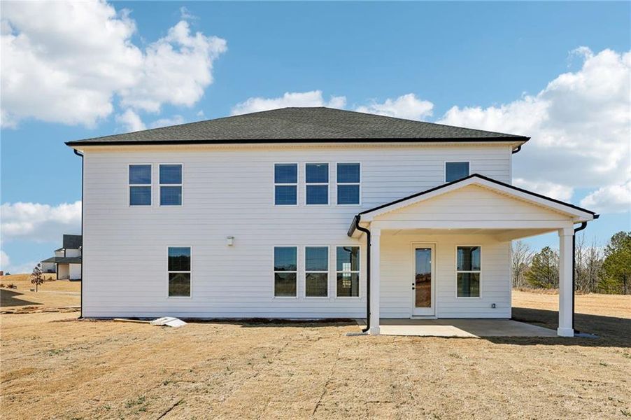 Exterior details and patio area of a home in River Pointe, Monroe (Image 4).