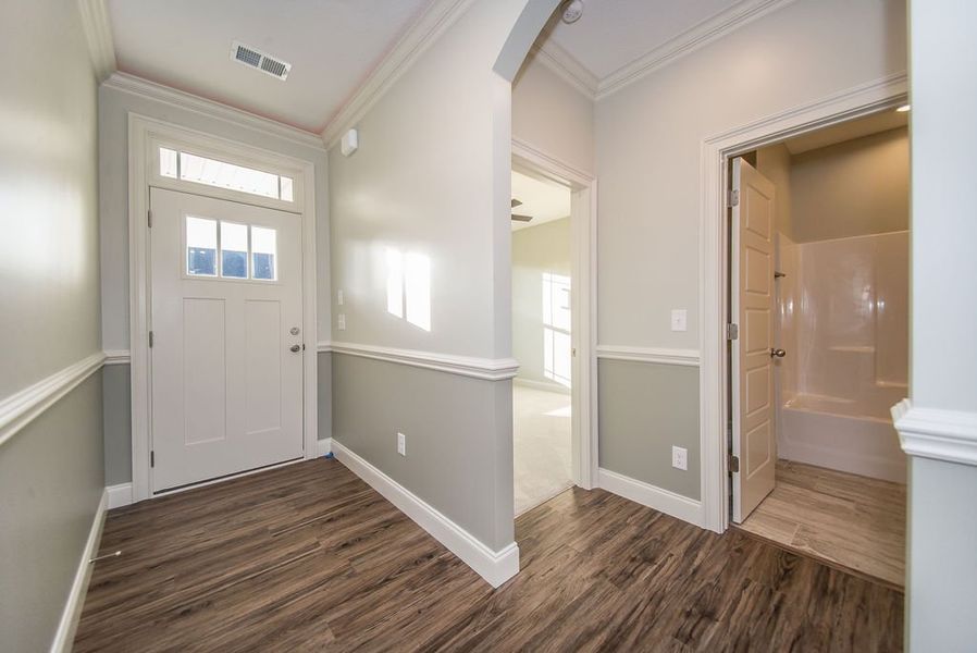 Representative unfurnished interior of a home built from the Mediterranean by Enchanted Homes in Messer Farms, Inman (Image 21).