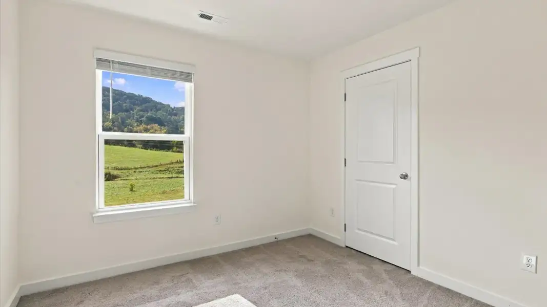 Representative unfurnished interior of a home built from the Glendale by D.R. Horton in Belhaven, Knoxville (Image 36).