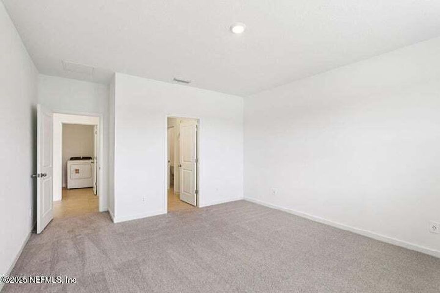 Spacious, unfurnished interior of a new home in Lakes at Bella Lago - Signature Series, Green Cove Springs (Image 35). Spacious, unfurnished interior of a new home in Lakes at Bella Lago - Signature Series, Green Cove Springs (Image 35).