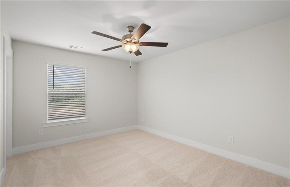 Spacious, unfurnished interior of a new home in Creekside at Skelton, Jefferson (Image 24).