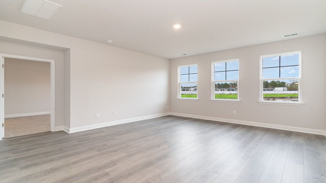 Representative unfurnished interior of a home built from the DARBY by D.R. Horton in Spring View Landing, Loris (Image 16).