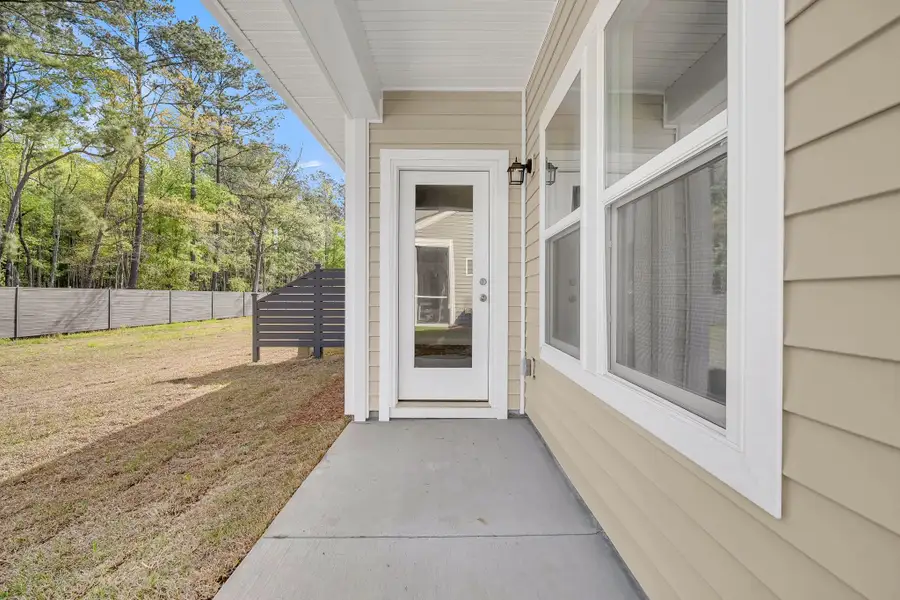 Exterior details and patio area of a home in Hammock Walk at Nexton, Summerville (Image 3).