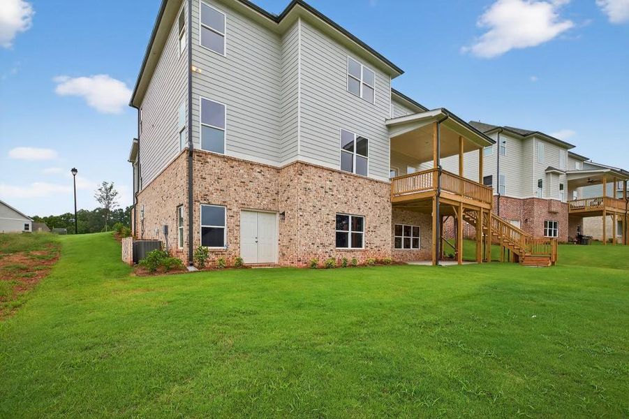 Front exterior of a new home in Traditions Of Braselton, Jefferson, GA, highlighting curb appeal (Image 23). Front exterior of a new home in Traditions Of Braselton, Jefferson, GA, highlighting curb appeal (Image 23).