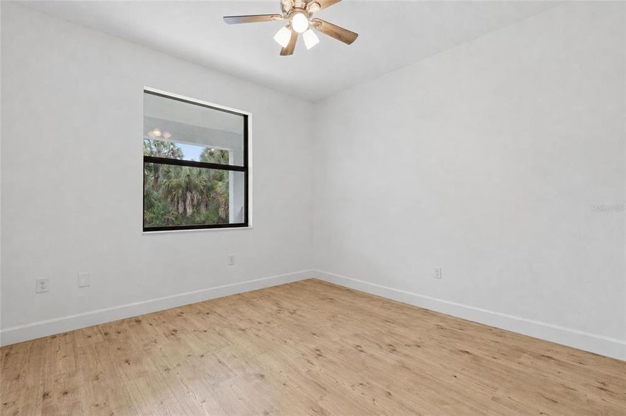 Spacious, unfurnished interior of a new home in , Port Charlotte (Image 31).