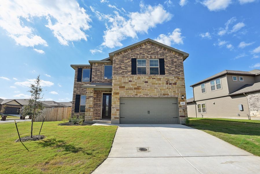 Front exterior of the Medina floorplan at a Meritage Homes community.