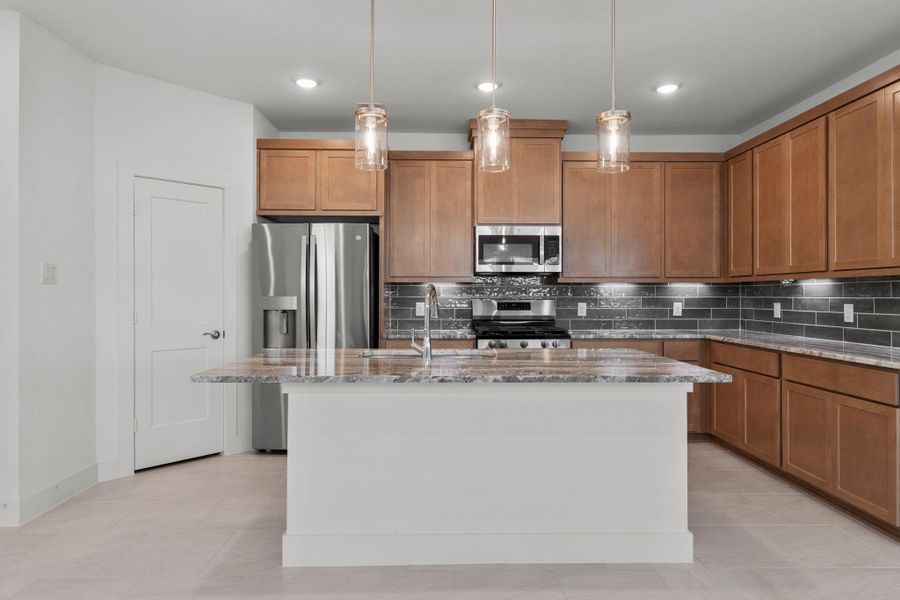 Furnished interior view inside a new home in Meridiana, Iowa Colony (Image 6).