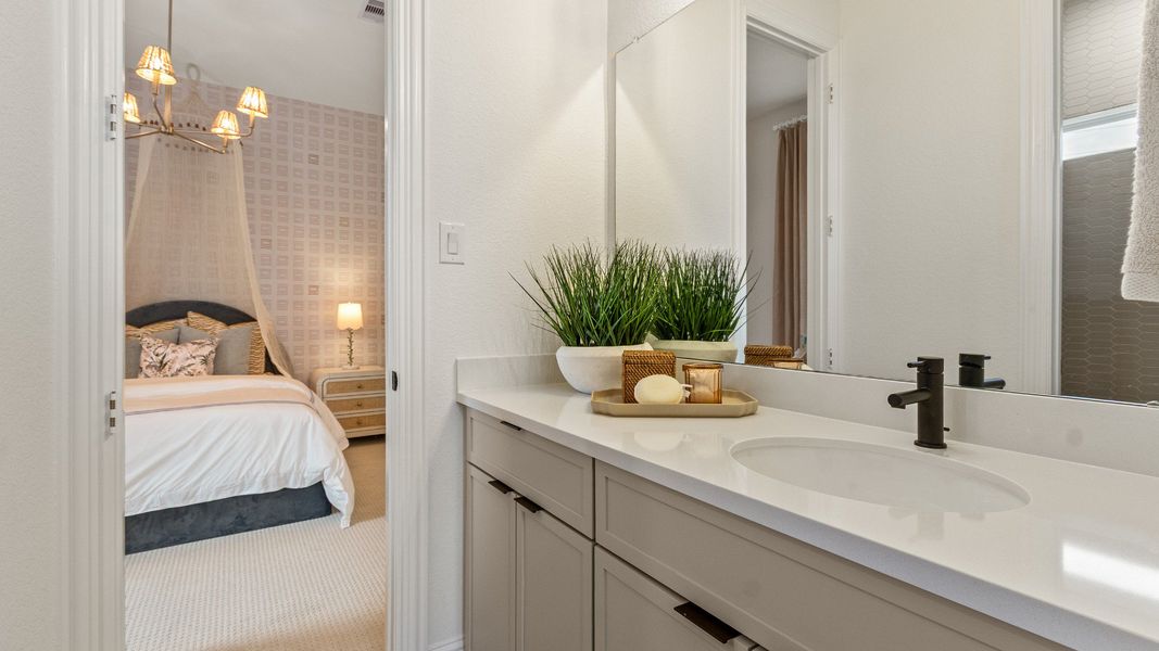 Representative furnished interior of a home built from the Villanova by DRB Homes in Creekhaven, Iowa Colony (Image 21).