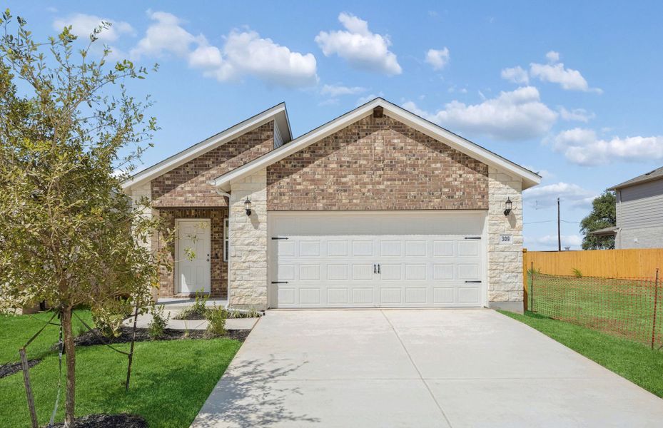 Front exterior of a new home in Crosswinds, Kyle, TX, highlighting curb appeal (Image 20).