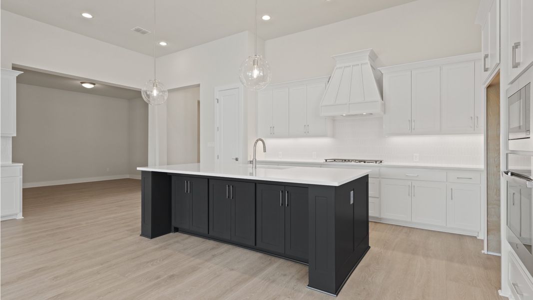 Furnished interior view inside a new home in Glynlea Country Club, Port St. Lucie (Image 3).