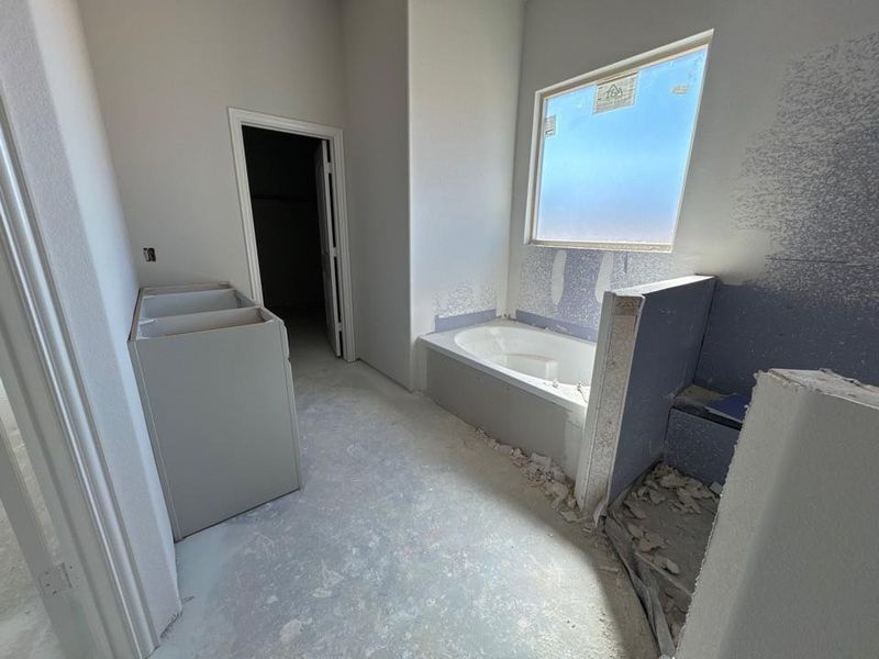 Full bathroom with a bath