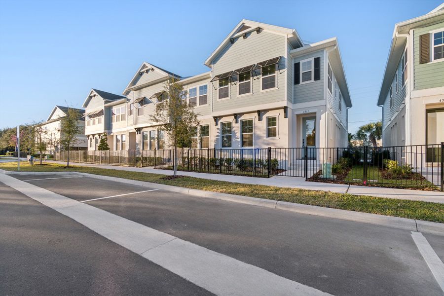 Front exterior of a new home in Baldwin Crossing 22', Orlando, FL, highlighting curb appeal (Image 24).