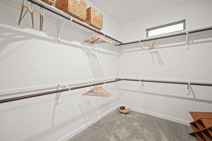 Primary Closet in the Oak home plan by Trophy Signature Homes – REPRESENTATIVE PHOTO