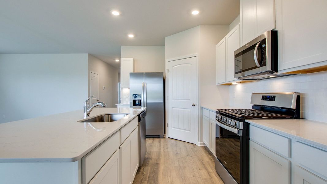 Furnished interior view inside a new home in Nexus South, Gallatin (Image 6).