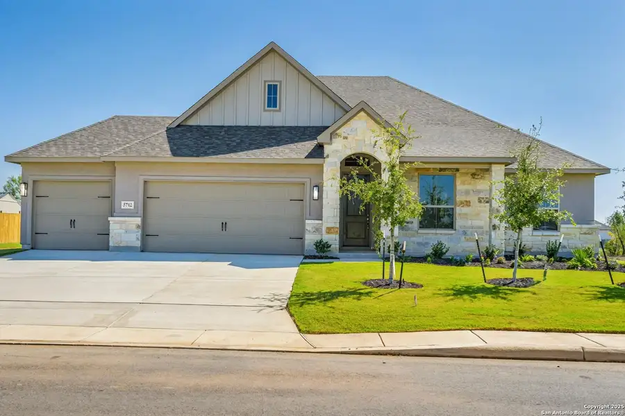 Front exterior of a new home in Annabelle Ranch, San Antonio, TX, highlighting curb appeal (Image 1).